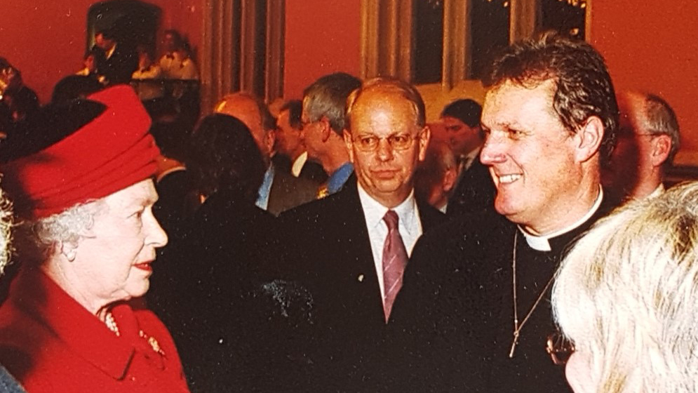 Richard Burridge with the Queen in 2002